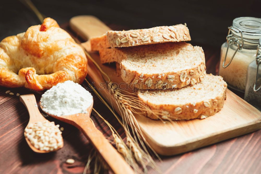 Similar – fresh bread and baked goods on wooden