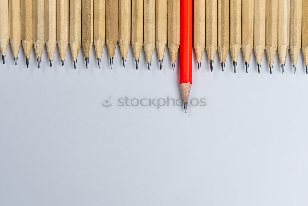 Similar – Red pencil and black pencil