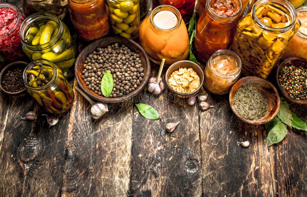 Spices and oil on table