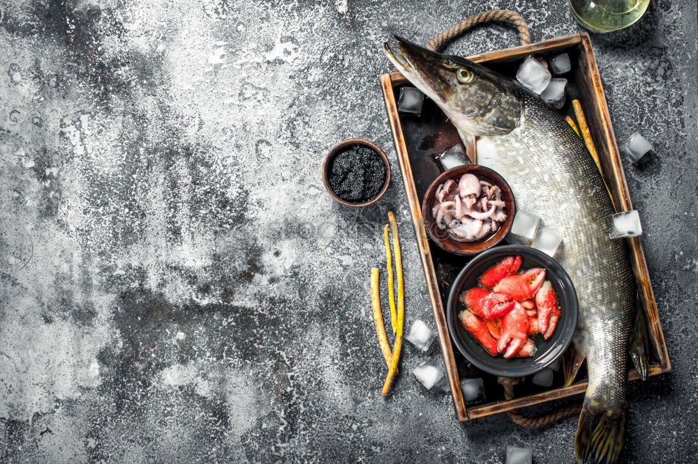 Similar – Carp with spices in a black cast-iron frying pan