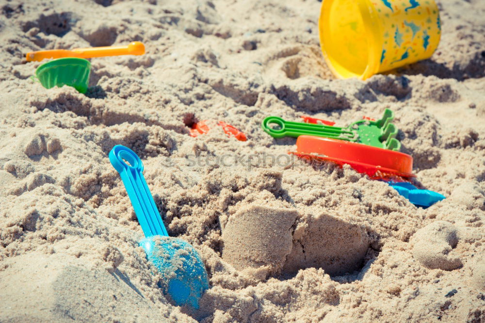 Similar – Image, Stock Photo Sand toys on the beach