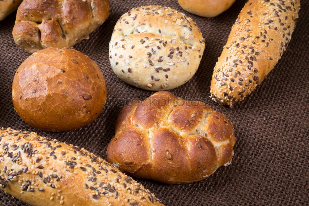 Similar – Many mixed breads and rolls.