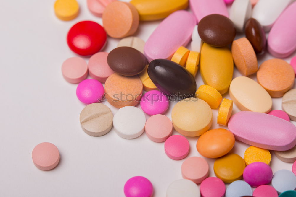 Similar – Hand and various pills on it. Human skin and medicines.