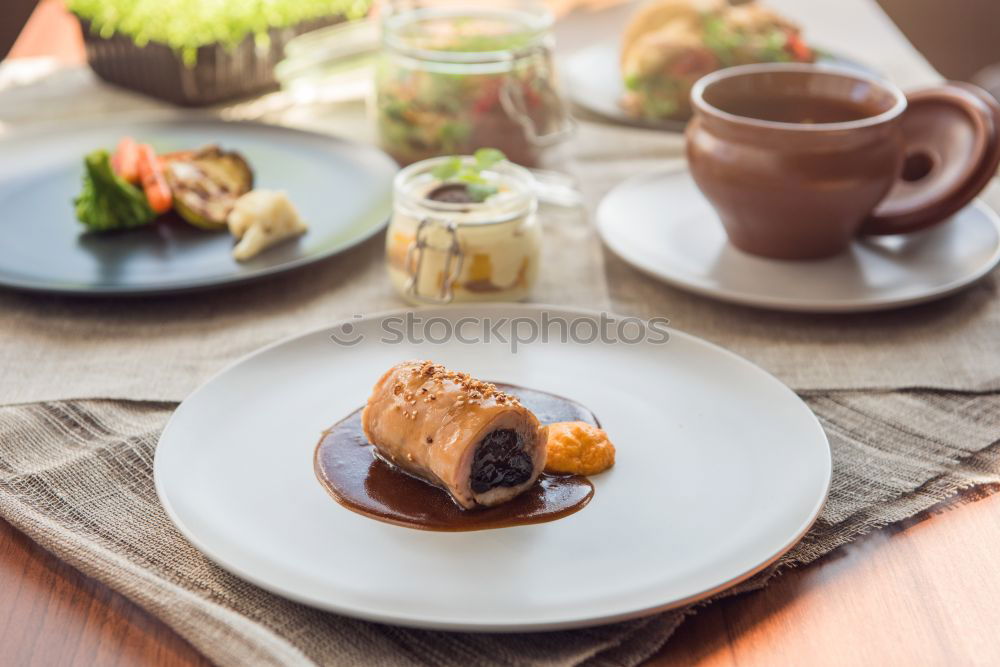 Similar – Image, Stock Photo Plum yeast particles with roibos tea