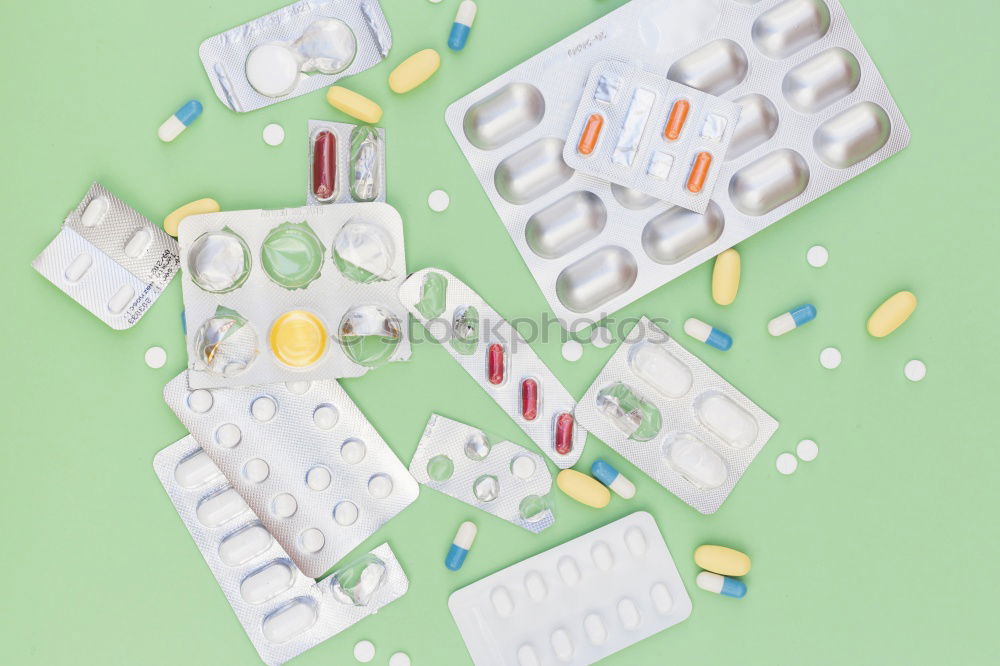 Similar – Image, Stock Photo colorful pills and medical bottles on green paper background