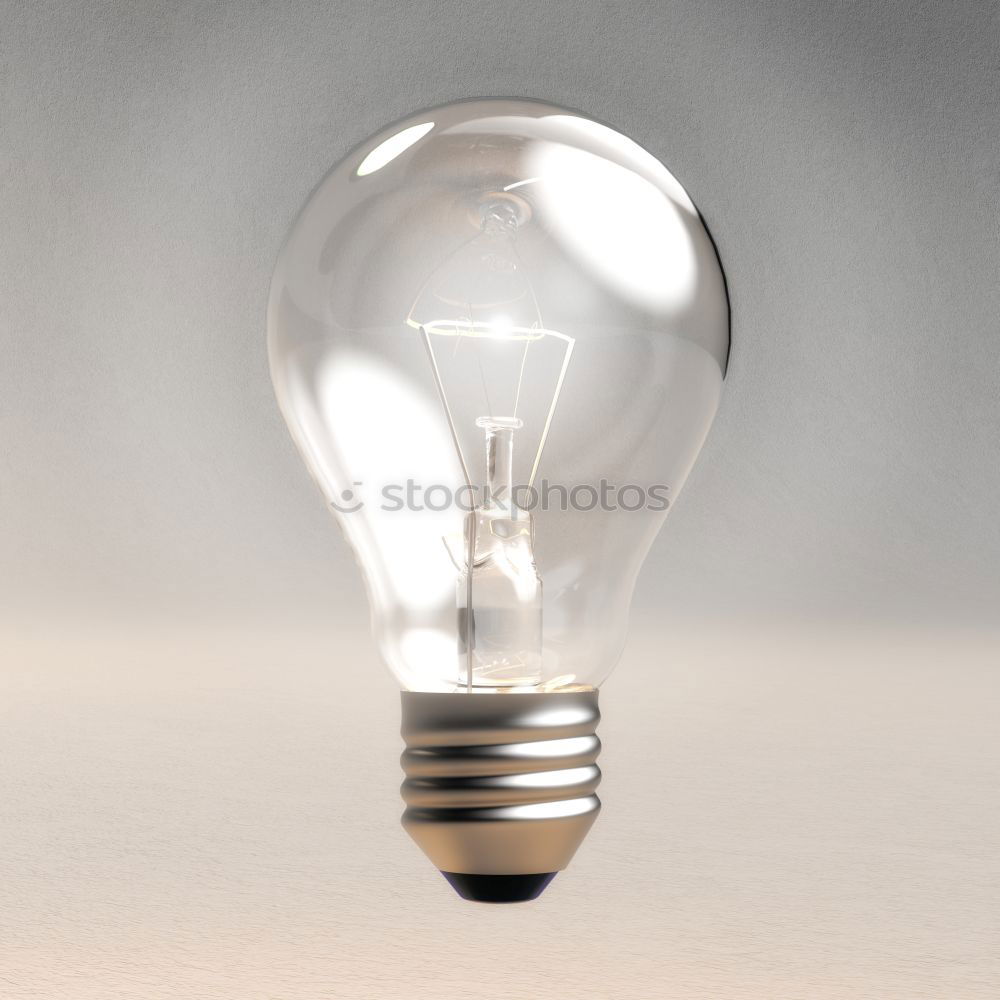 empty light bulb, held by a female hand