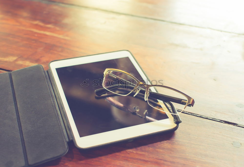 Similar – Image, Stock Photo keyboard and phone with black screen on wooden desk.