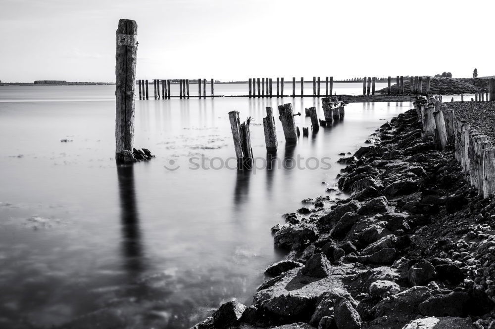 Similar – Fishing flags, sea, jetty