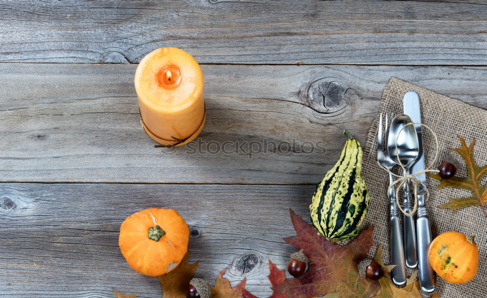 Similar – cup of carrot juice in female hands on a gray wooden surface