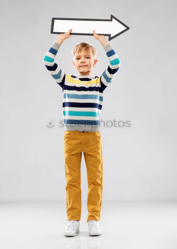 Similar – Image, Stock Photo smiling child holding a blackboard