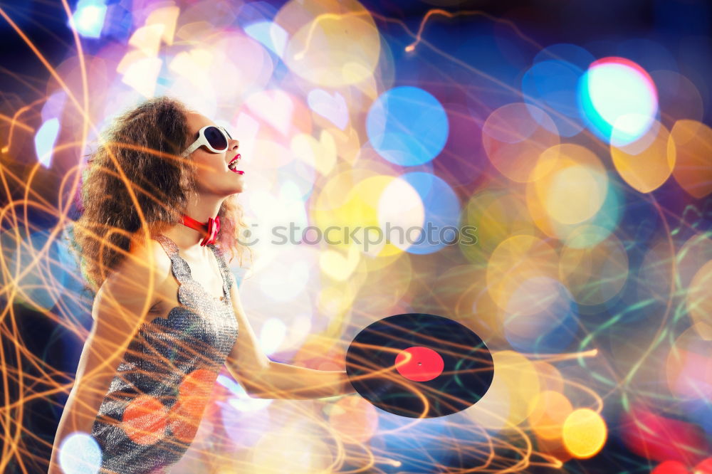 Beauty girl with glasses with little lights in her hands