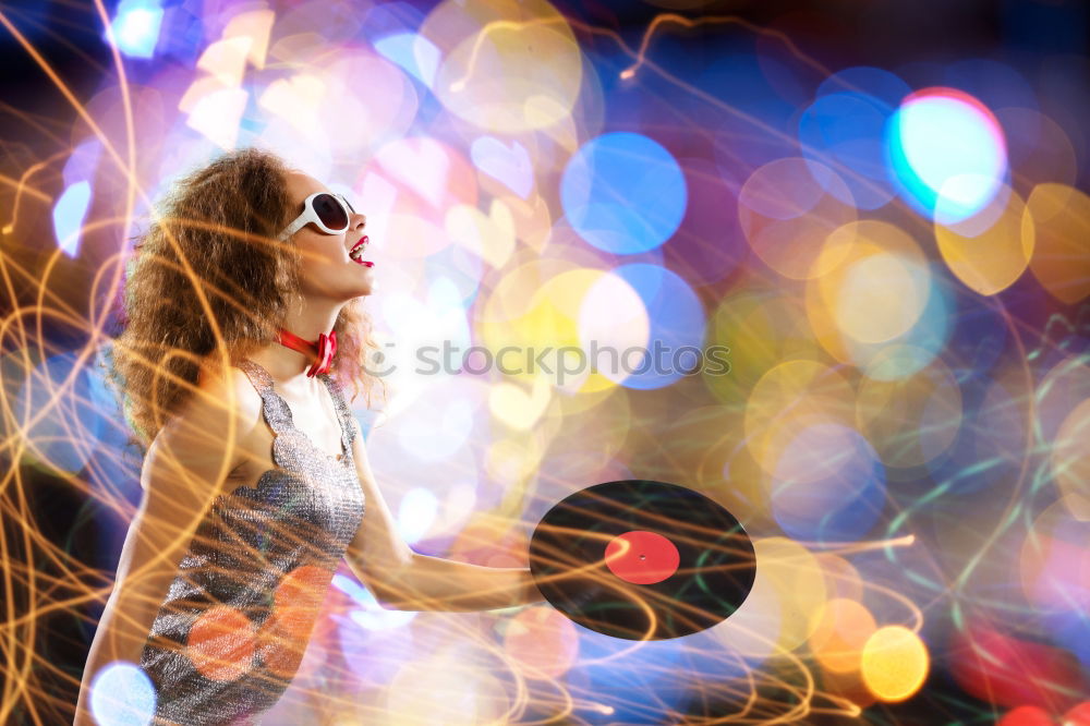 Similar – Beauty girl with glasses with little lights in her hands