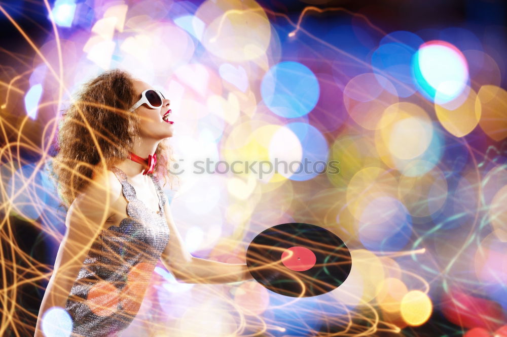 Similar – Beauty girl with glasses with little lights in her hands