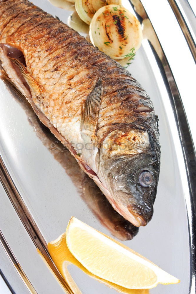 Similar – Dorado fish with ingredients for cooking