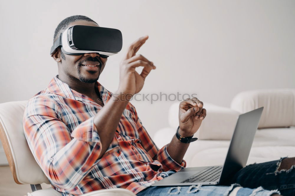 Similar – Image, Stock Photo Father and son playing with VR glasses.