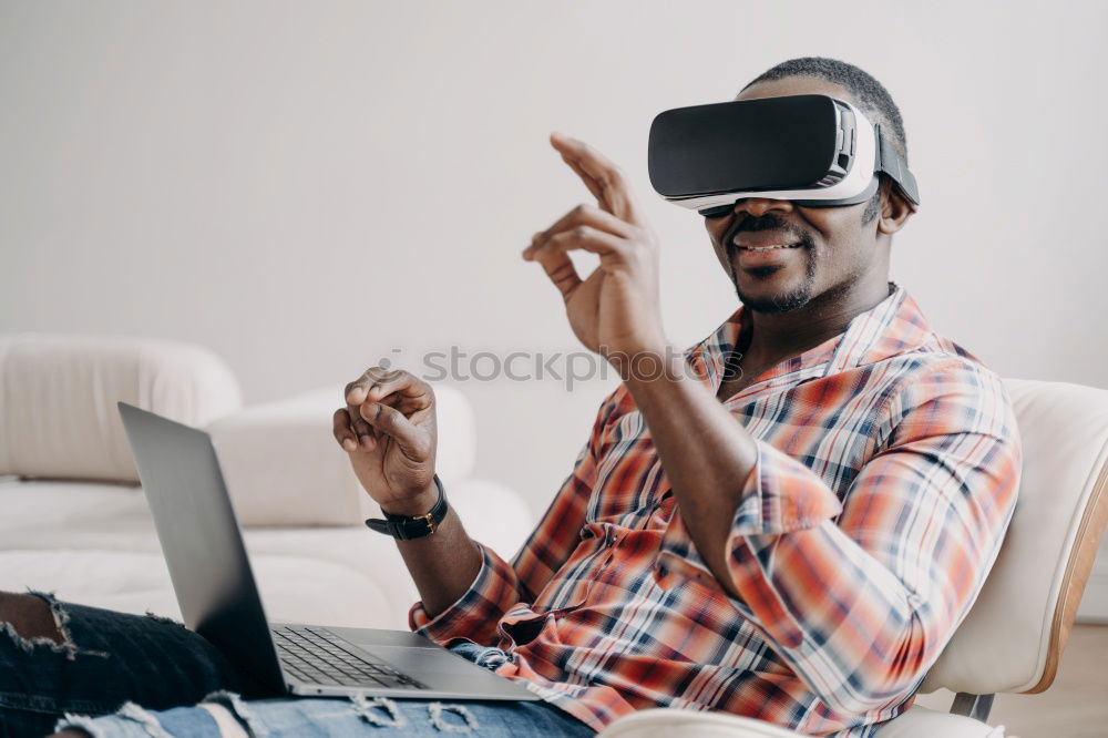 Similar – Image, Stock Photo Father and son playing with VR glasses.