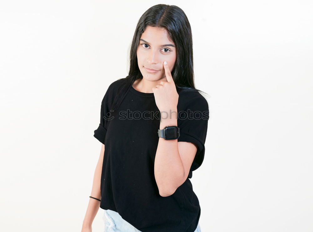 Similar – Young woman leaning on white wall