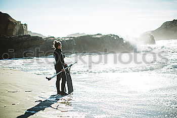 Similar – Image, Stock Photo Fisherman on sea beach with waves