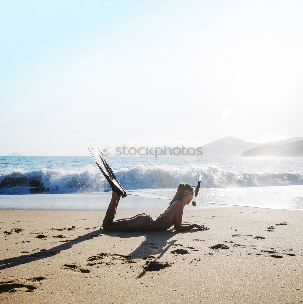 Similar – Child and dog by the sea