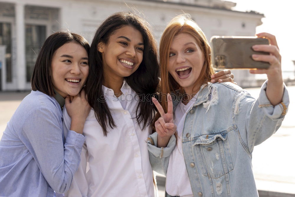 Image, Stock Photo Women taking selfie in studio