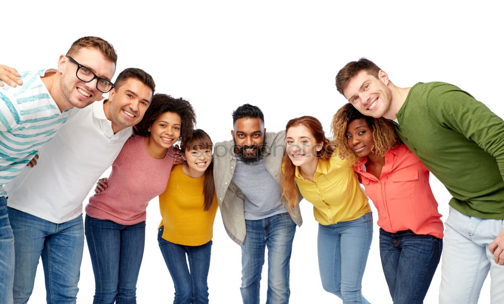 Similar – Group of multi-ethnic young people laughing together outdoors in urban background.