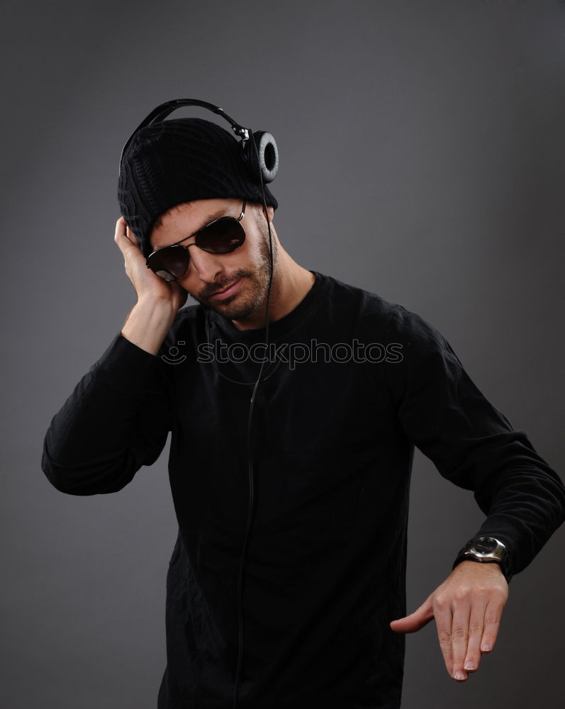 Similar – Confident man wearing stylish sunglasses