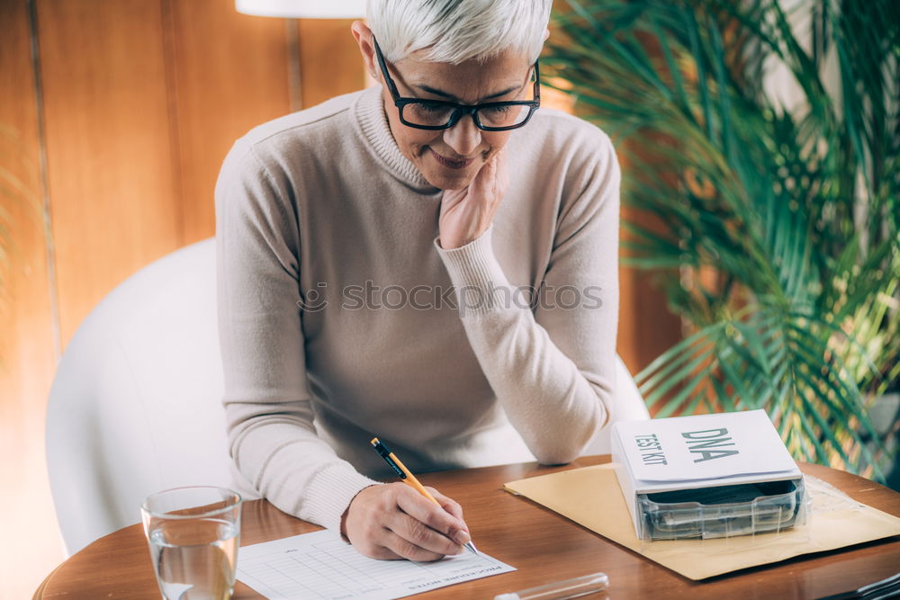 Similar – Image, Stock Photo Desperate student in front of an open book