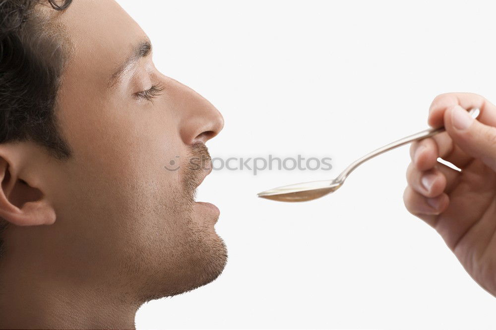 Image, Stock Photo Young man eats fresh fish