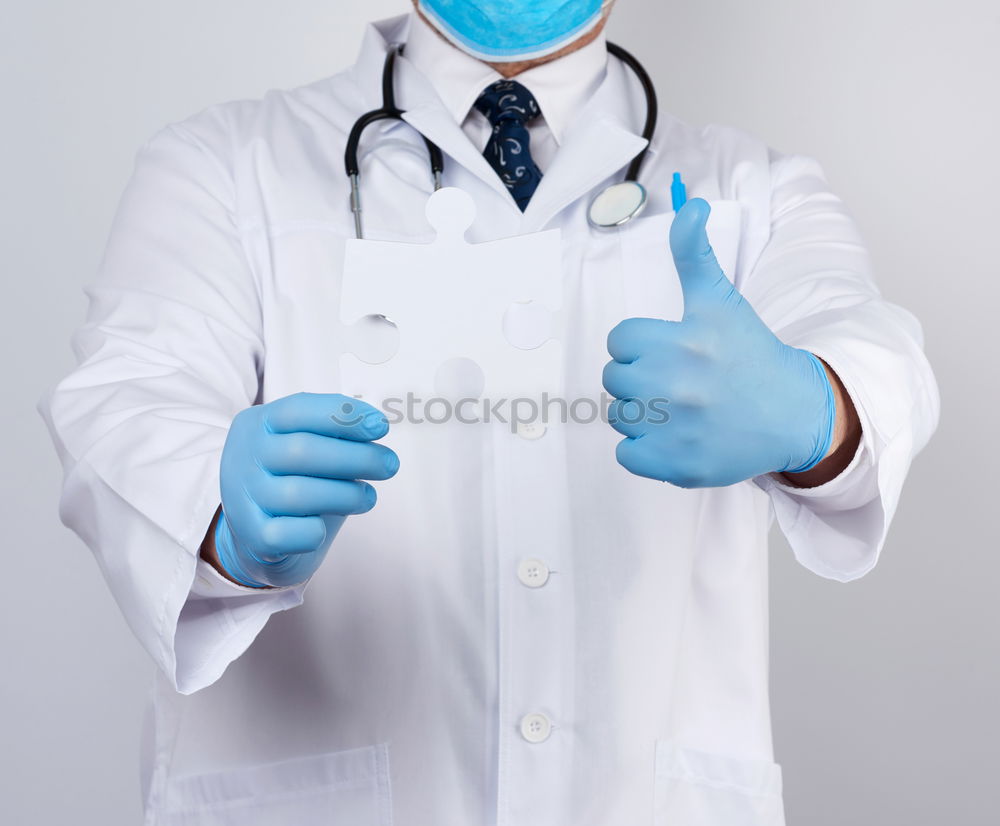 Similar – human hand holding a medical stethoscope