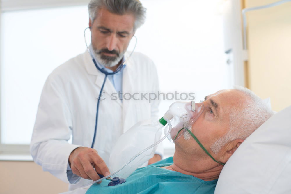 Similar – Doctor holding syringe with vaccine and making injection to senior patient. Covid-19 or coronavirus vaccine