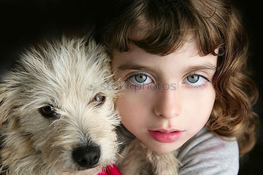 Similar – boy hugging his dog