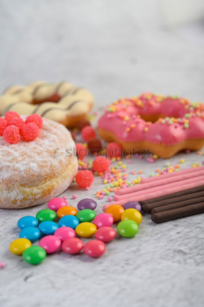 Similar – Freshly baked donuts with glaze