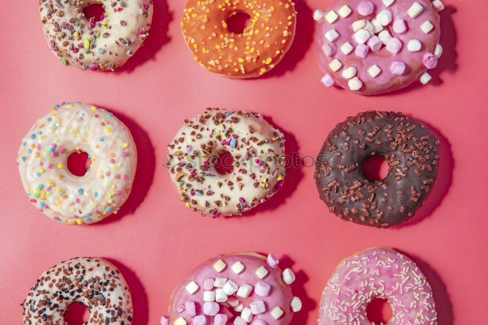 Similar – Sugar sweet donut on pink background