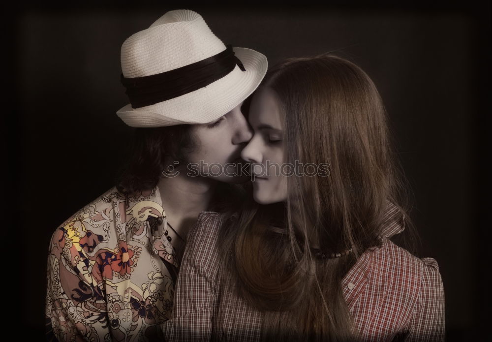 A young, wild, and naked couple kissing under a tree. White blossoms, summer night, and sexy curves. It’s the feeling of love that’s everywhere around with these gorgeous nude bodies in front of a camera.