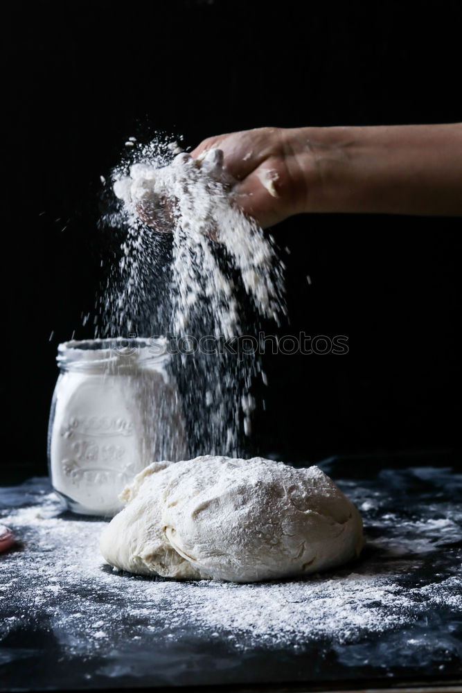 Similar – Image, Stock Photo white wheat flour in male hands, black background