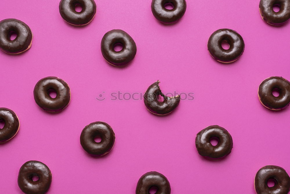 Similar – Sugar sweet donut on pink background