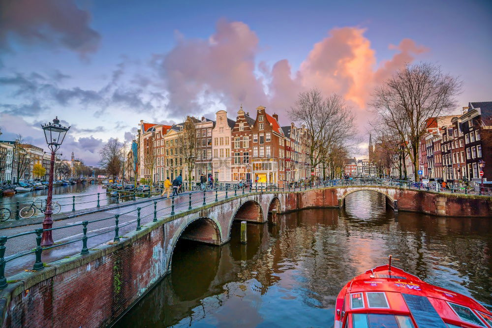 Similar – Image, Stock Photo Woman looking at sunset at one of the canals in Amsterdam