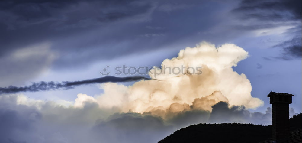 Similar – Alpine village in mountains. Smoke, bonfire and haze