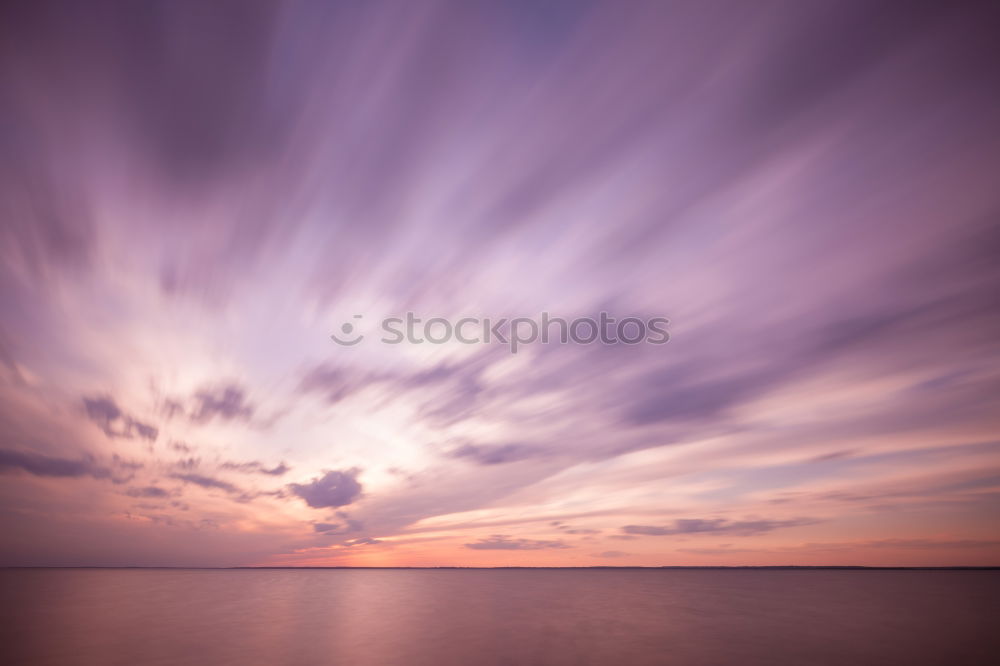 Similar – Image, Stock Photo purple sunrise over North sea beach and lighthouse, Texel