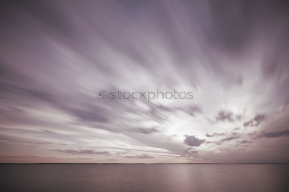 Similar – Image, Stock Photo purple sunrise over North sea beach and lighthouse, Texel