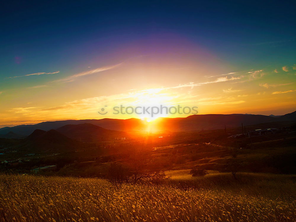 Similar – Red rising sun on top of an electric pole