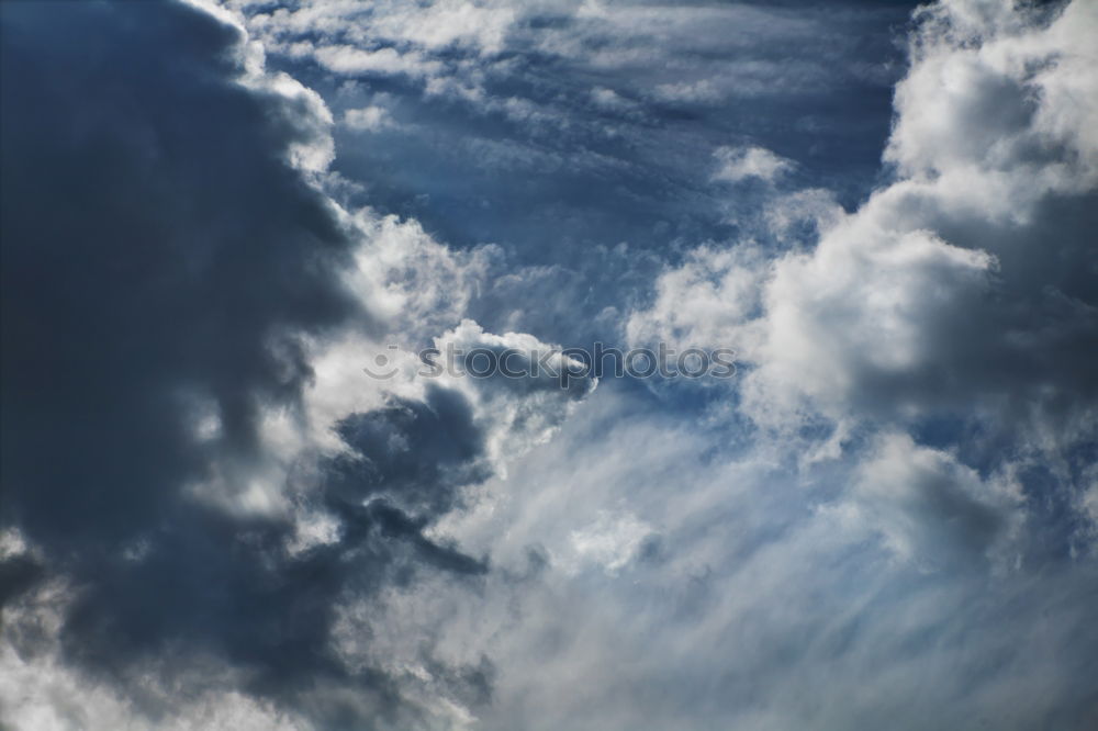 Similar – Foto Bild komisches Wetter Wolken