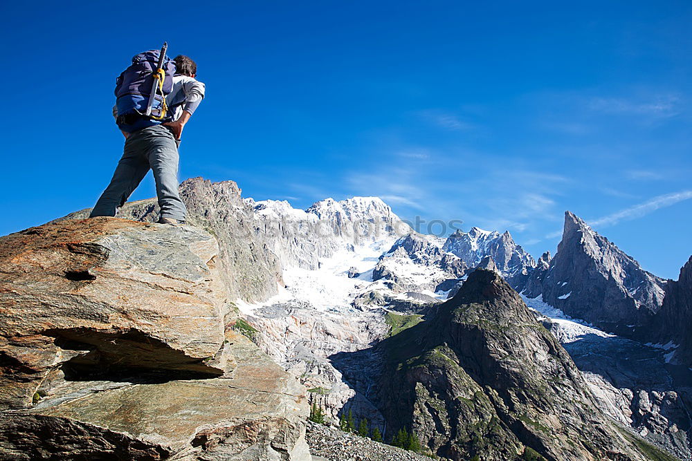 Similar – Hiker photographs the landscape