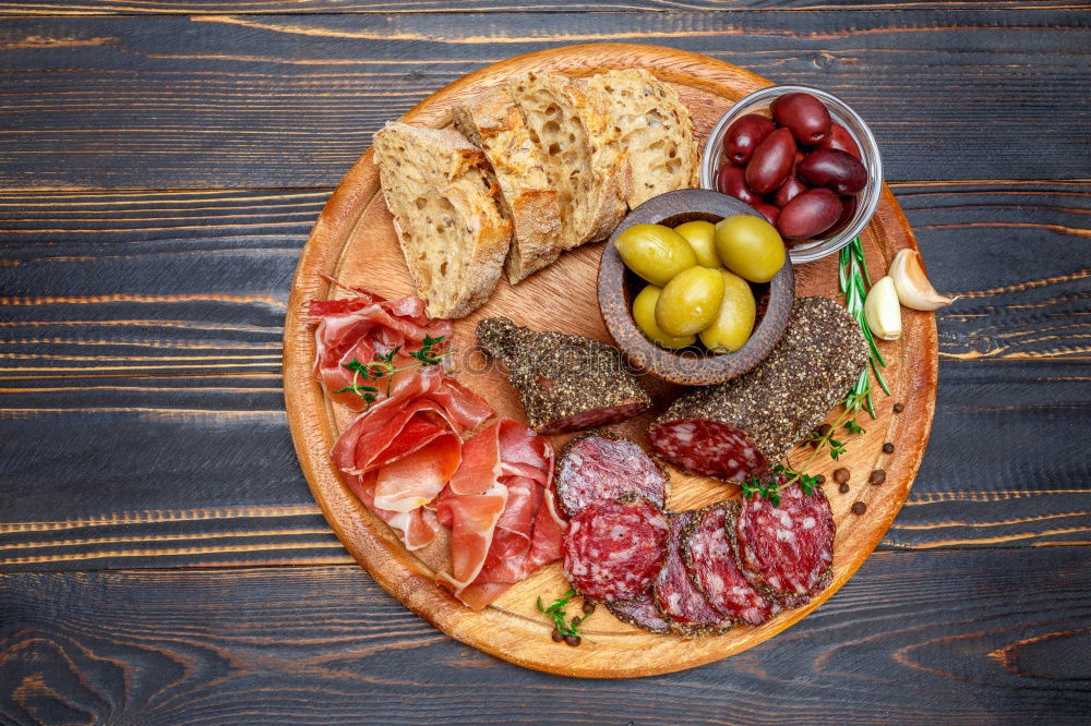 Similar – Delicious antipasti ingredients for sandwiches