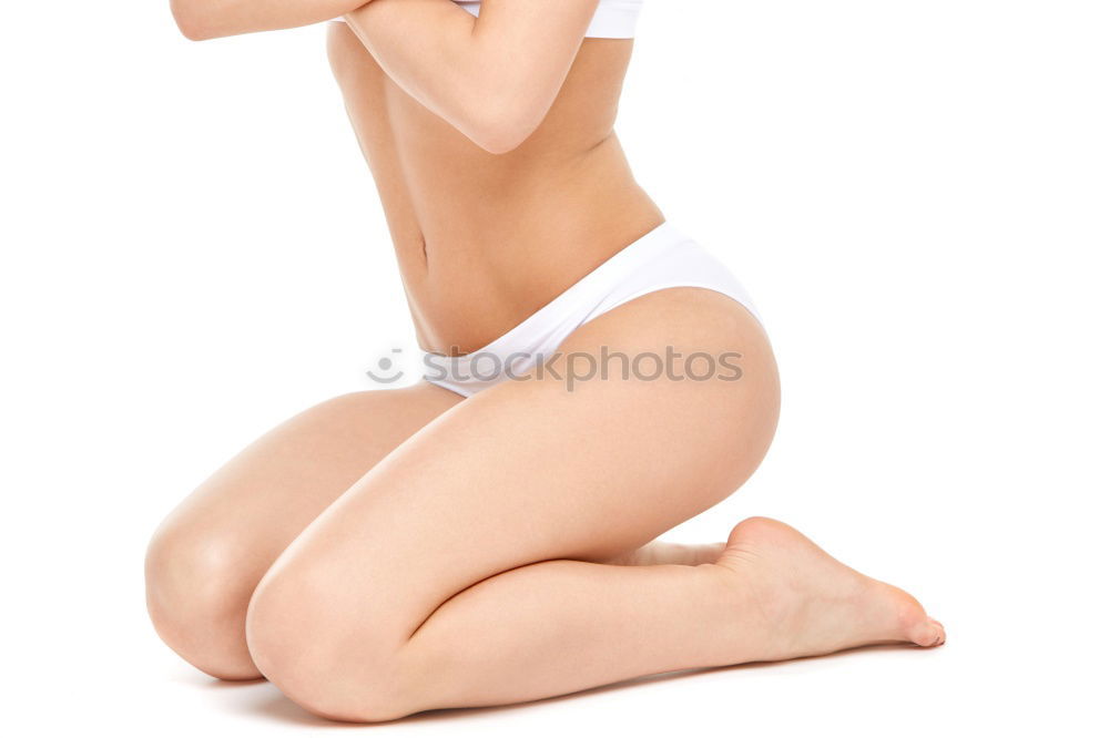 Similar – Image, Stock Photo Alluring young naked woman covering her breasts and front of her torso with a fresh clean white a towel as she looks at camera with a sultry expression and parted lips over a white studio background
