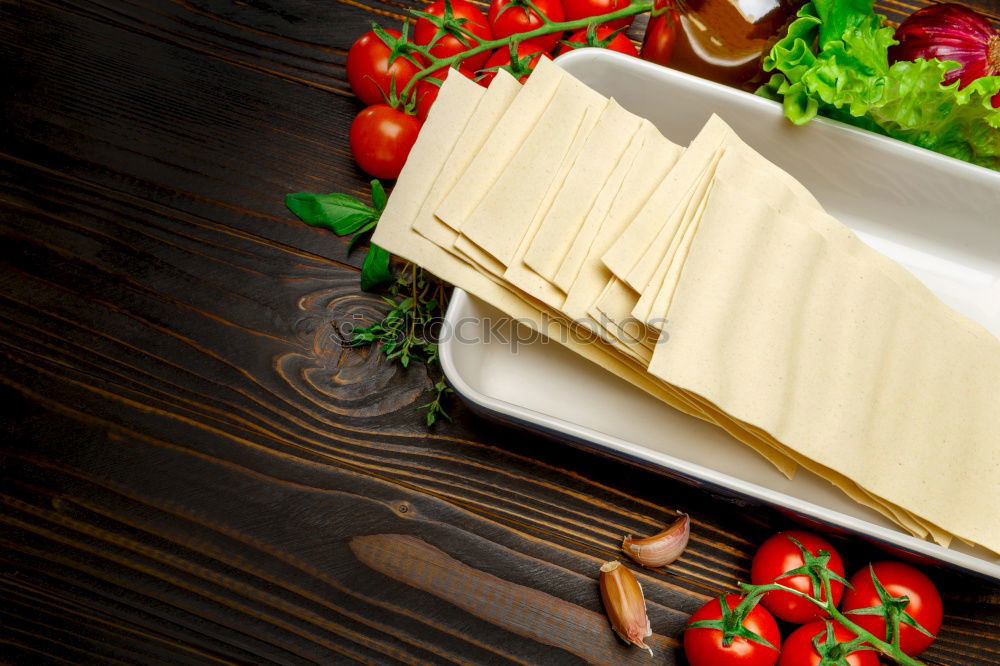 Similar – Image, Stock Photo Leaf of dough with rhubarb and strawberries