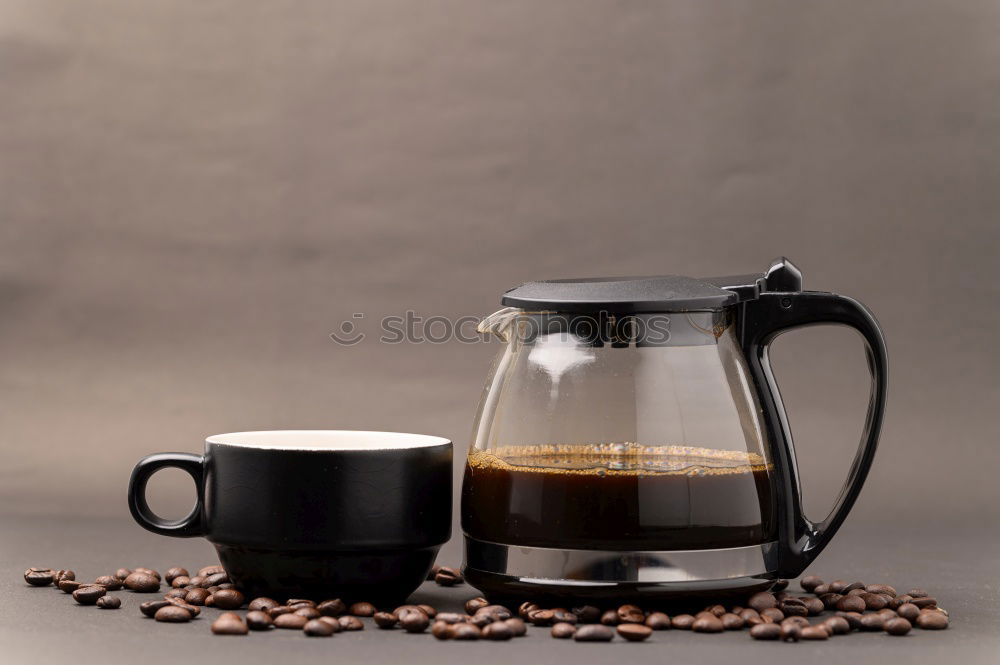 Similar – Glass coffeepot, white porcelain filter, light brown filter paper and dark brown continuous bubble forming coffee, apple, egg in wooden egg cup, white cup, corn waffles, white table in front of grey wall in the morning light.