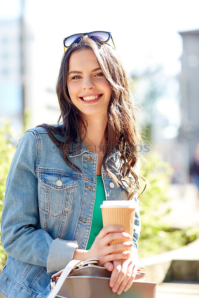 Similar – Woman posing sitting in outside cafe