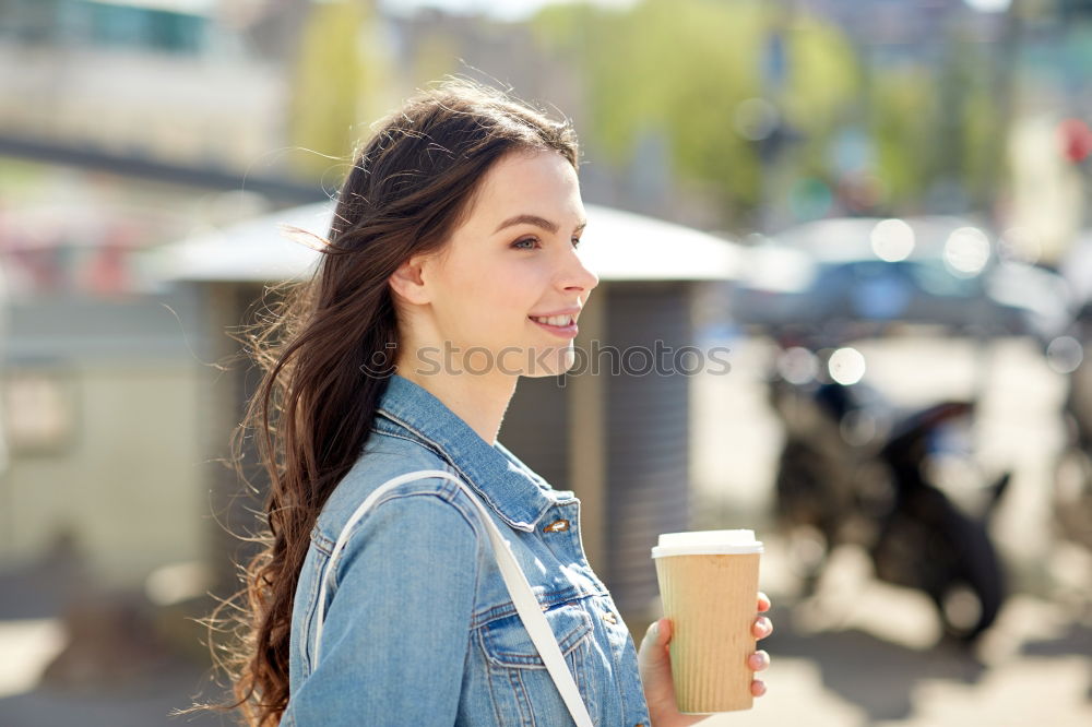 Similar – Woman posing sitting in outside cafe