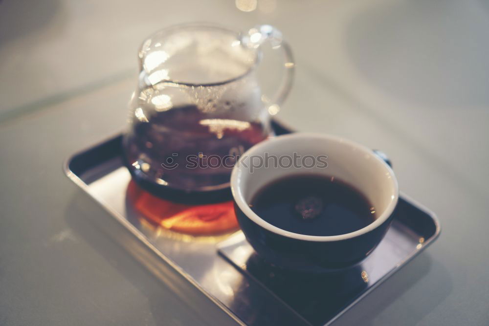 Similar – Image, Stock Photo Hand drip coffee, pouring water on coffee ground with filter drip style